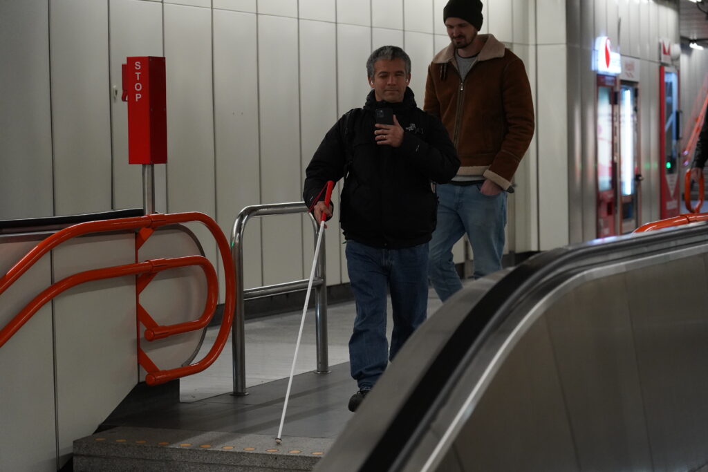 A Dreamwaves user navigates a metro station in Vienna.